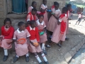 Grapesyard-school-girls-enjoy-hot-lunch